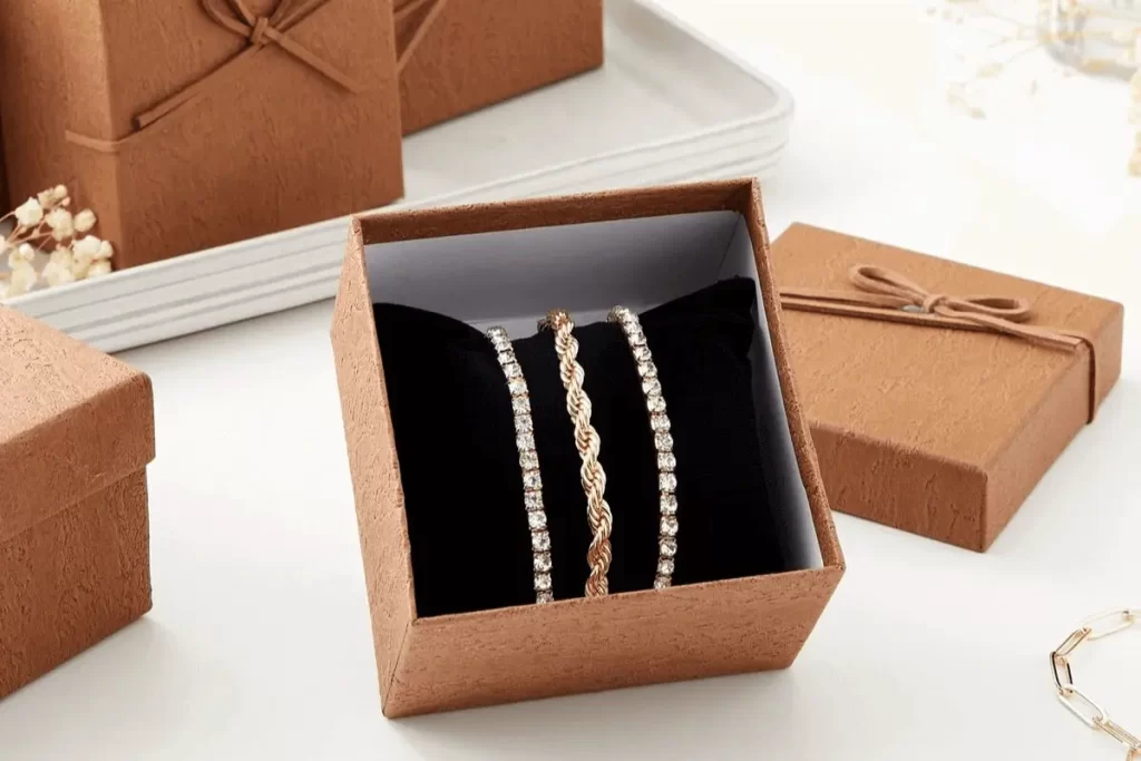 Gold bracelet within a custom designed bracelet box